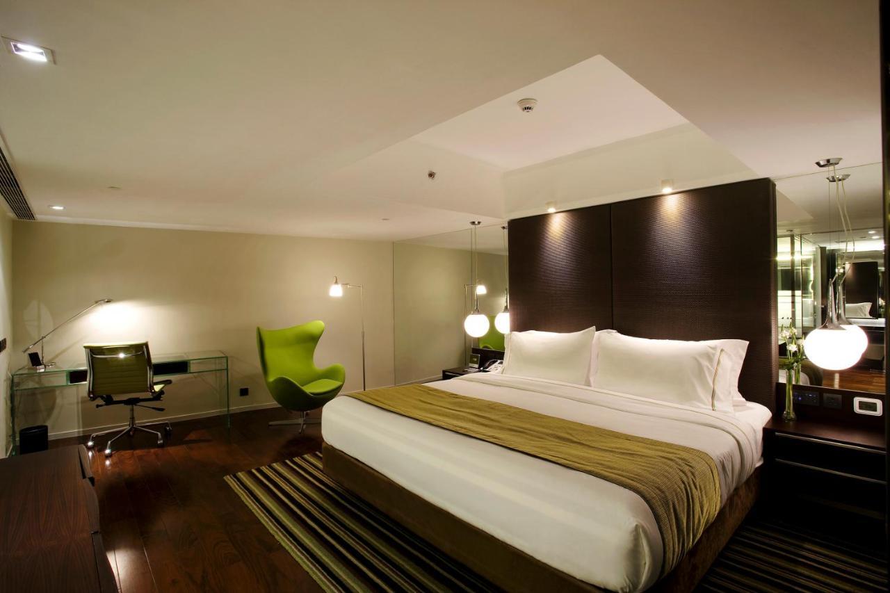 Hotel The Mira Hongkong Exterior foto A bedroom at the hotel